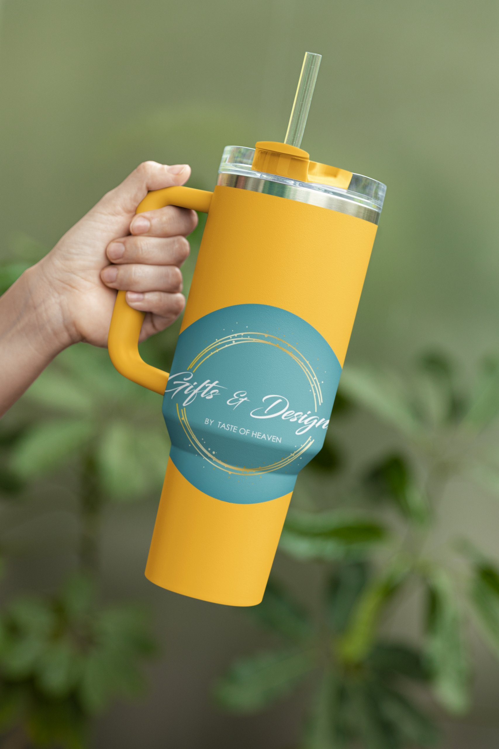 mockup-of-a-person-s-hand-holding-a-sublimated-stanley-tumbler-m51045